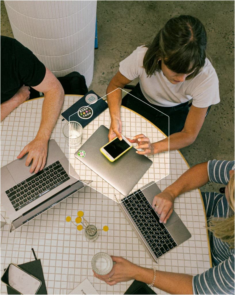 Je Suis Web Solutions team collaborating on digital projects